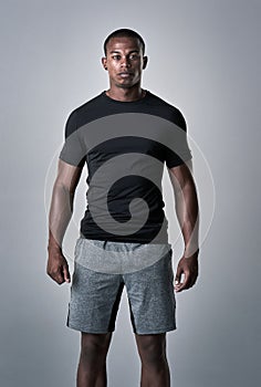 Ive got a goal that Im trying to achieve. Studio portrait of an athletic young man standing against a grey background.