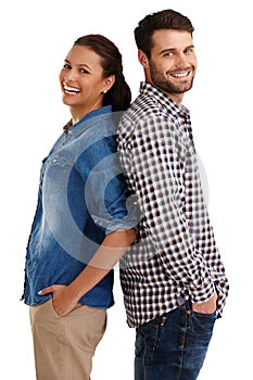 Ive got her back, and shes got mine. Studio portrait of a happy young couple standing back to back isolated on whuite.