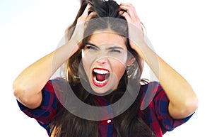 Ive reached my breaking point. Studio shot of a young woman shouting against a white background.