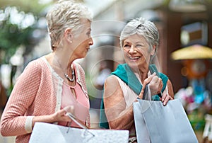 Ive still got a few more bucks to spend. a two senior women out on a shopping spree.