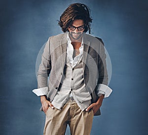 Ive always upheld my optimistic mind. Studio shot of a handsome young man posing against a grey background.