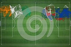 Pobřeží slonoviny vs slovensko fotbalový zápas, národní barvy, státní vlajky, fotbalové hřiště, fotbal, kopírování vesmíru