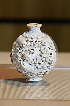 Ivory dog and cloud snuff bottle photo