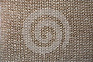 Ivory knitted fabric from above ribbing pattern