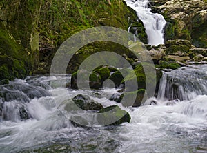 Ixkier ur-jauzia. Ixkier waterfall on the Plazaola greenway, Mugiro, Navarra photo