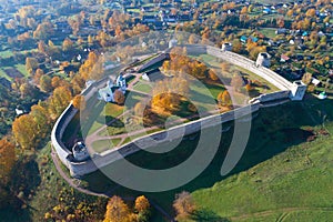 Izborsk fortress with a bird eye view in golden autumn. Pskov region, Russia