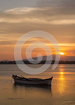 Izmir aliaga yenisakran bay sunset and a solo boat