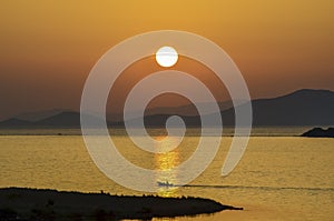 Izmir aliaga yenisakran sea and sunset a boat