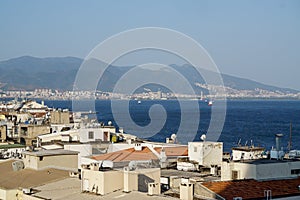 Izmir alsancak seaside with roof of the buildings photo