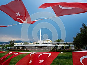 Izmir, Turkey - April 29 2023: People are doing morning sports in a park by the sea