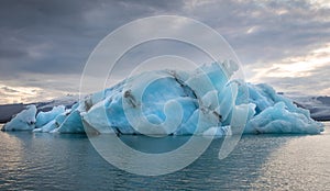 Dying Iceberg in Glacier Lagoon photo