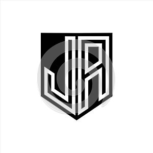 JA Logo monogram shield geometric white line inside black shield color design photo