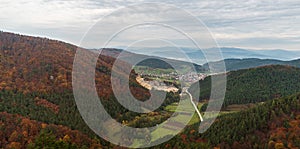 Jablonove village with huge quarry nearby and hills around in Slovakia - view from hiking trail to Sulovsky hrad castle during