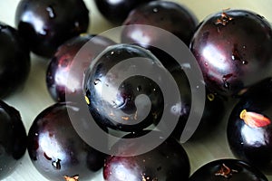 Jabuticaba or Jaboticaba is a purplish-black, white-pulped fruit.