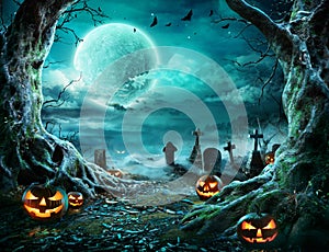 Jack `O Lantern In Cemetery In Spooky Night