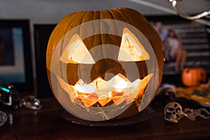 Jack-o`-lantern dribbling with a candle