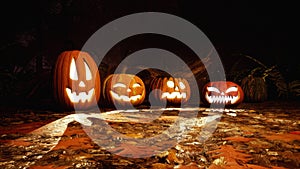 Jack-o-lantern pumpkins in dark scary night forest