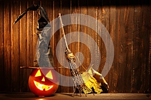 Jack o lanterns Halloween pumpkin face on wooden background