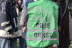 Jacket Orde Dienst At The Niet Mijn Schuld Demonstration At Amsterdam The Netherlands 5-2-2022
