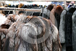 Jackets fur coat hanging and second-hand clothes for sale in fl