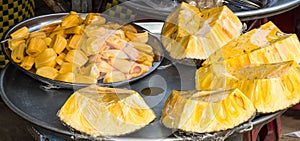 Jackfruit slices on a tray on the market