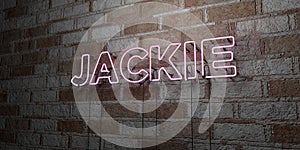 JACKIE - Glowing Neon Sign on stonework wall - 3D rendered royalty free stock illustration