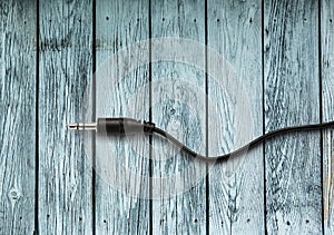 Jackplug on the wooden background