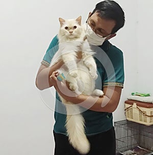 Jacky is carried by his handsome owner