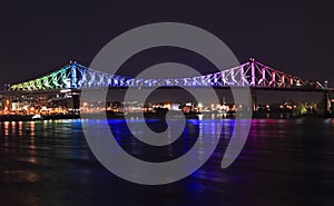 Jacques Cartier Bridge illuminated at night in Montreal