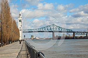 Jacques Cartier bridge and tower clock in Montreal in Canada photo