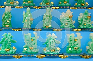Jade figurines of the Chinese three stars deities and Chinese characters enlargement of wealth