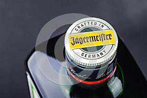 Jagermeister digestif on gradient background.