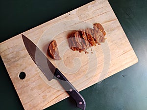 Jaggery on a chopping board.