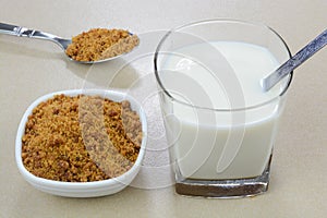 Jaggery milk in a glass cup