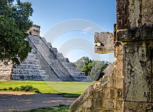 Jaguar head and Mayan Temple pyramid of Kukulkan - Chichen Itza, Mexico