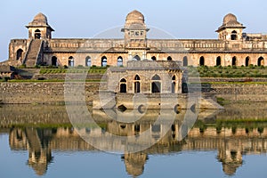 Jahaz Mahal , Ship Palace and blue water lake in sunrise. Mandu, Madhya Pradesh, India