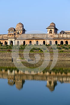 Jahaz Mahal , Ship Palace and blue water lake in sunrise. Mandu, Madhya Pradesh, India