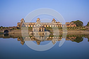 Jahaz Mahal , Ship Palace and blue water lake in sunrise. Mandu, Madhya Pradesh, India