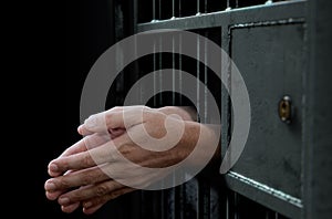 Jail Cell Door And Hands