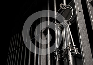Jail Cell With Open Door And Bunch Of Keys photo