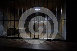 Jail or prison cell. Old grunge prison miniature. Dark prison interior creative decoration. Empty cell. Selective focus Obsolete