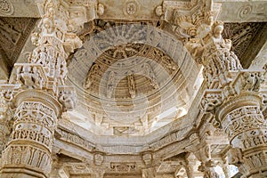 Ranakpur Jain Temple, main domed ceiling and finely carved marble columns with bas-reliefs, Rajasthan photo