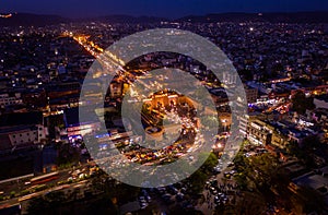 Jaipur pink city gate at night, India, aerial drone view