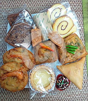Jajanan Pasar Selection of Indonesian Street Food Snacks, Bakwan, Martabak,Samosa photo