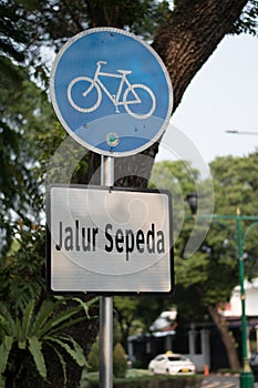 Jakarta, Indonesia - June 26, 2020; A sign of ``Jalur Sepeda`` means ``Bicycle Lane``