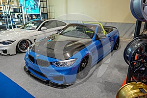 White BMW 435i convertible F33 on parking lot