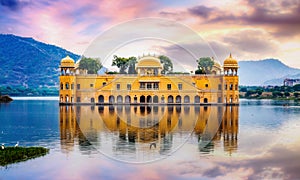 Jal Mahal a beautiful ancient palace in the middle of a lake surrounded by scenic landscape at Jaipur Rajasthan India