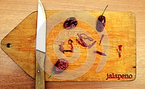 Jalapeno pepper on a cutting board