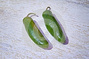 jalapeno peppers on white background. Green chili pepper. Capsicum annuum.
