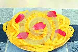 jalebi traditional gujrati indian snack food dish in de focused circle background